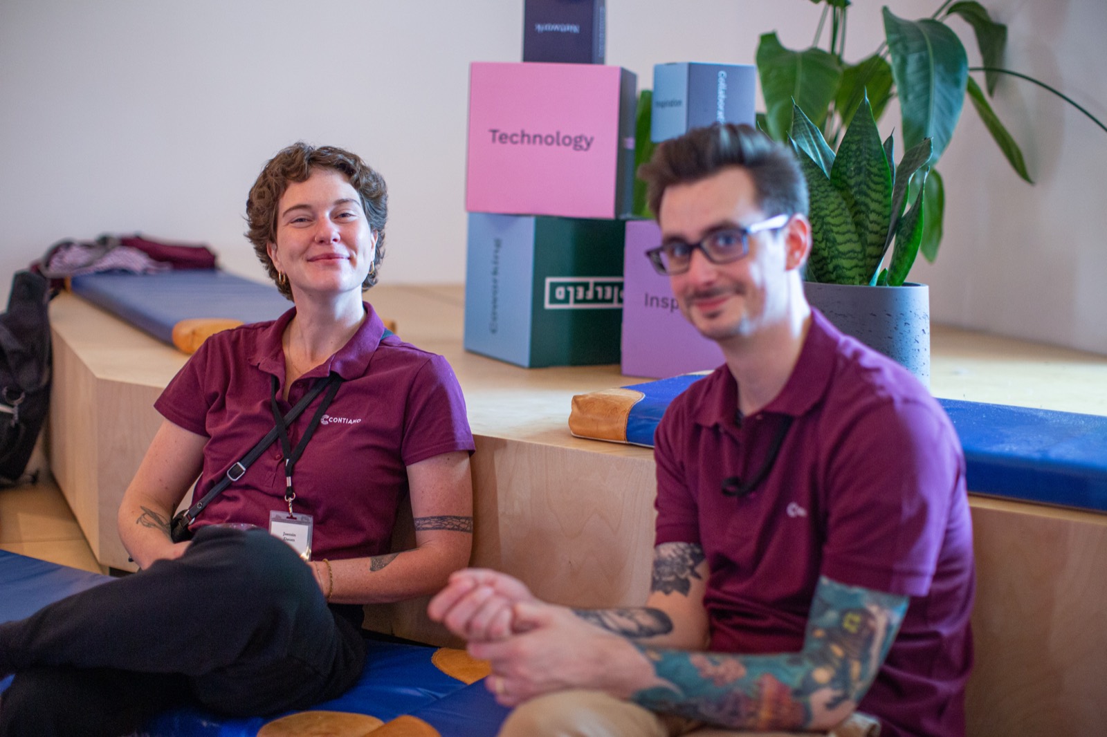 Two Contiamo colleagues sitting together at the office